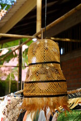Bamboo hat lamp on the roof
