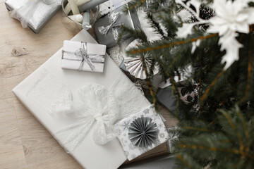 Gift boxes under the Christmas tree, Merry Christmas and Happy New Year