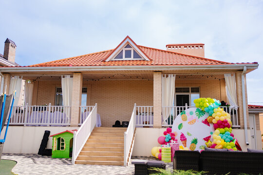 the photo zone with candy bar in the yard of the house. 