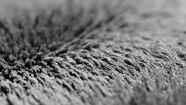 Iron powder. Abstract background. Iron powder under the influence of a magnetic field. 