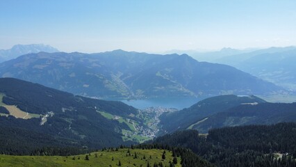 Lake Zel Am See, Austria in Mountain Range - Ariel Drone shot - obrazy, fototapety, plakaty