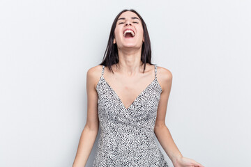 Young caucasian woman isolated on white background relaxed and happy laughing, neck stretched showing teeth.