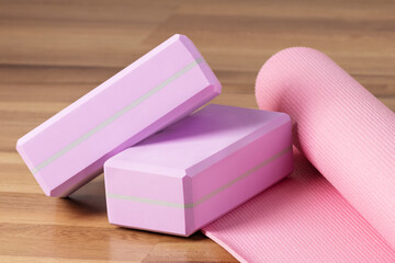 Yoga blocks and exercise mat for training. Yoga equipment.
