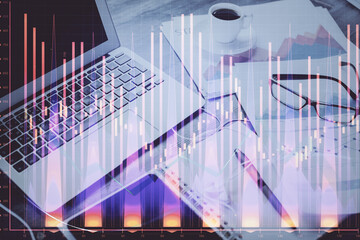 Forex market chart hologram and personal computer background. Multi exposure. Concept of investment.