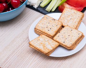 Healthy breakfast concept with biscuits, vegetables and fruits
