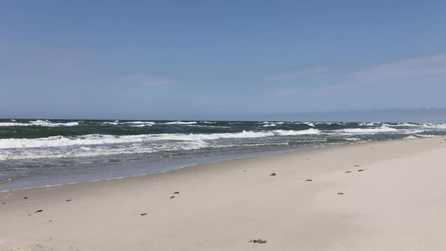 Curonian spit, beautiful vibrant view of Kurshskaya Kosa National Park, Curonian Lagoon and the Baltic Sea, Kaliningrad Oblast, Russia and Klaipeda County, Lithuania, summer day.