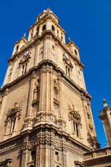 Fototapeta na wymiar Impressive bell tower of the Cathedral of Murcia 