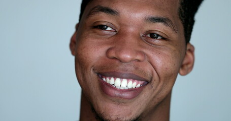 Handsome young black African person smiling portrait