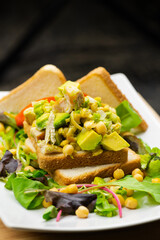 Sandwich with white meat, chickpea and avocado