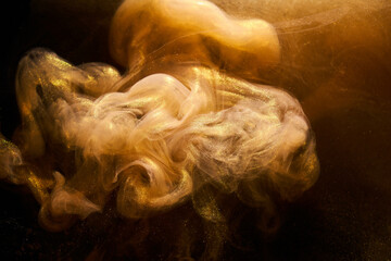 Liquid fluid art abstract background. Ocher jets and smoke rings dancing acrylic paints underwater, space ocean, color explosion © amixstudio