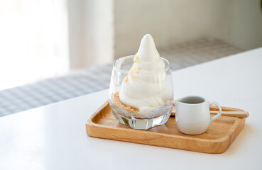 Affogato Espresso on wooden disk on the white table near windows in coffee shop, ice cream, cafe,...