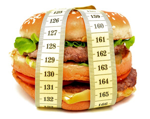 Fast food burger tied with measuring tape