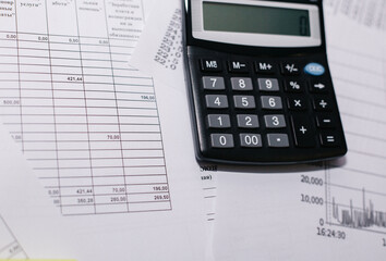 Calculator, pen, graph, white background