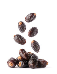 fresh dates falling isolated on white background, edible and tropical sweet fruits, closeup