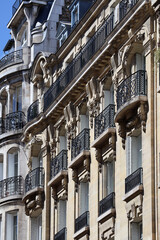 Naklejka premium Typical Parisian building facade of the 19th century, in the Haussmann style