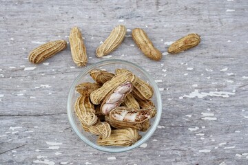 Peanut on old white wood background