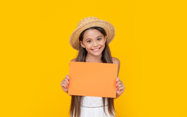 glad teen child with copy space on orange paper on yellow background