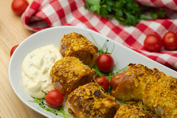 Crispy rolls with spicy sausage