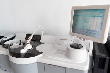 Centrifuge machine and a computer in a hospital