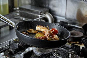 Process of frying seafood with vegetables. Seafood recipes