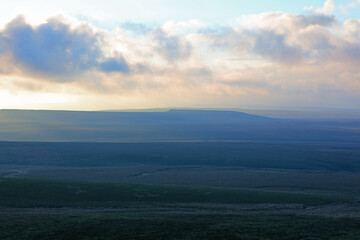 Fototapeta premium Dramatic Lighting over the Pennine Hills at Sunset, North Yorkshire, UK England.
