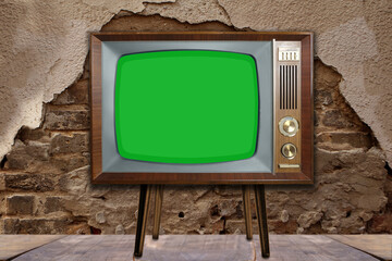 old retro analog TV with blank screen, 1960-1970, concept of obsolescence, modernization or technological revolution, stylish mockup, template for video, background for designer with copy space