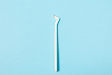 orthodontic toothbrush with one bundle for braces on a blue background special tool for oral care