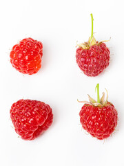 set of beautiful and ripe raspberries isolated on white background