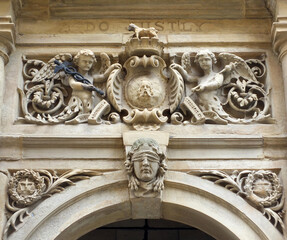 carvings on the entrance above the door of halifax town hall in