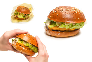 Hamburger in woman hands isolated on a white background.