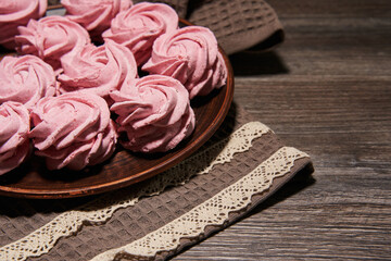 beautiful pink homemade marshmallow on a dark background close-up
