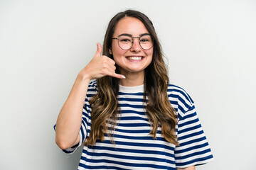 Young caucasian woman isolated on white background showing a mobile phone call gesture with fingers.