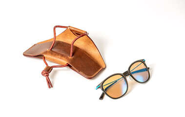 Brown Leather Case for glasses and Conceptual elegant Sunglasses on white background