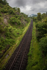 Fototapeta na wymiar Konkan Railway track passing through hilly region of Coastal Karnataka district of Karwar, India.
