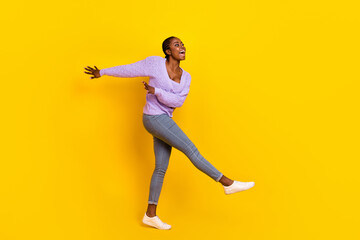 Fototapeta na wymiar Full size photo of crazy overjoyed person enjoy dancing clubbing isolated on yellow color background
