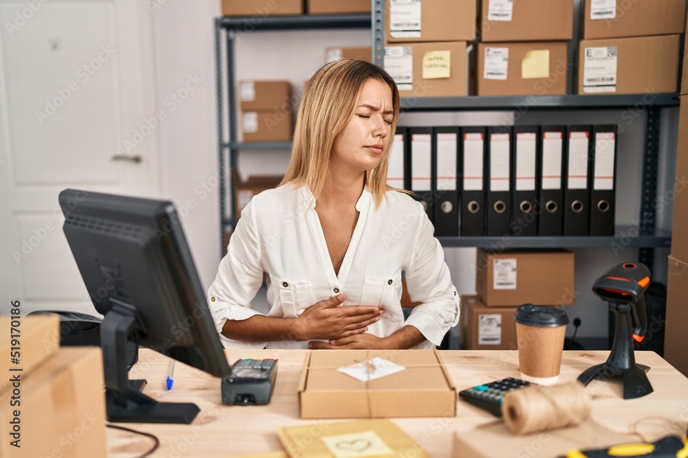 Sticker young blonde woman working at small business ecommerce with hand on stomach because nausea, painful 