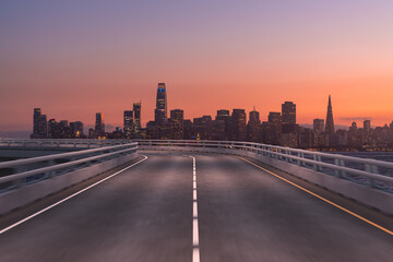 Fototapeta premium Empty urban asphalt road exterior with city buildings background. New modern highway concrete construction. Concept way to success. Transportation logistic industry fast delivery. San Francisco. USA.