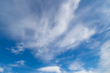 Blue sky cirrus clouds.