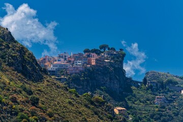 Fototapeta na wymiar Houses on top of the hill Taormina