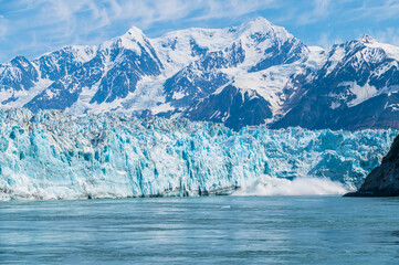 A view of the Hubbard Glacier calving in Russell Fjord in Alaska in summertime
