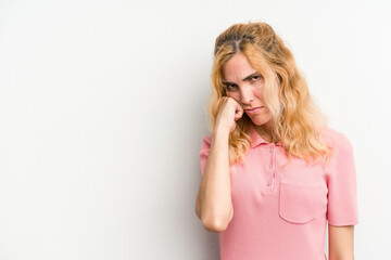 Young caucasian woman isolated on white background who feels sad and pensive, looking at copy space.