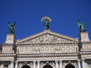 Decorated with sculptures and bas-reliefs, the upper part of the facade of the Lviv Opera building. Some of the sculptures are protected from damage and erosion.