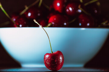 cherries in a glass bowl