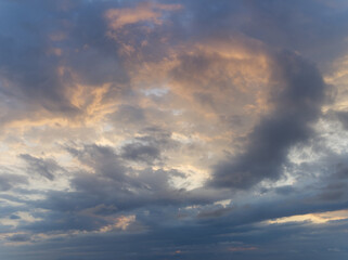 Swirl of clouds at sunset moody sky