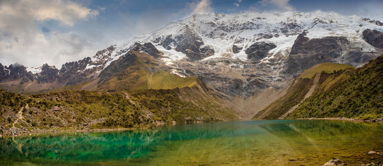 The lagoon is located near the Salkantay snow-capped mountain in the Andes Mountains of Cusco, Peru