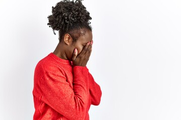 Young african american woman wearing casual clothes over isolated background with sad expression covering face with hands while crying. depression concept.