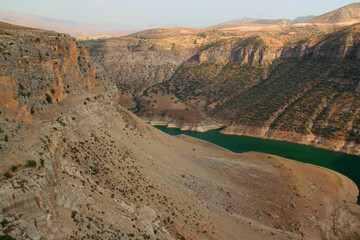 Fototapeta na wymiar A mountain canyon and the Botan River (a tributary of the Tigris River) in a national park near the city of Siirt in the Southeast Anatolia region of Turkey