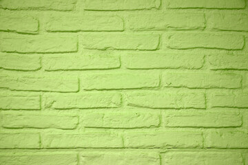 Stone texture background. Closeup of a green brick wall texture. Abstract brick stones pattern background concept, retro layout, interior design and wall banner.
