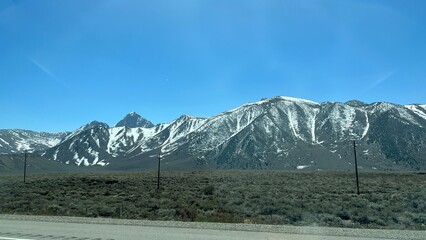 View of mountains seen from highway on the way to Mammoth Lakes and ski resort, California