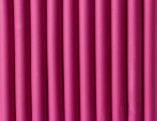 Abstract Background of Pink Rubber Pipes. Pink rubber tubes for decoration. Pink hair curlers, closeup. Selective focus. Colorful curlers for hairdress. Cylinders lined up in a row. - Powered by Adobe